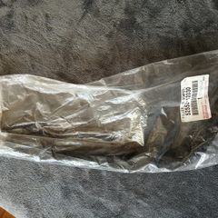 Genuine Toyota Corolla Ae10, 92-97 Part 52552-12030 (filler, Rear Bumper, Rh)