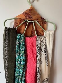 Hanger Organiser multi use - Scarf, Belt, Jewellery- Soft Green Brand New With 6 Scarves / shawls In Mint Condition.  (6)