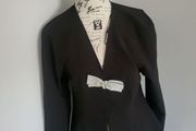 black jacket with bow