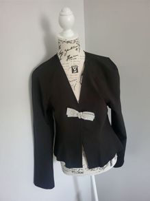 black jacket with bow