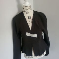 black jacket with bow