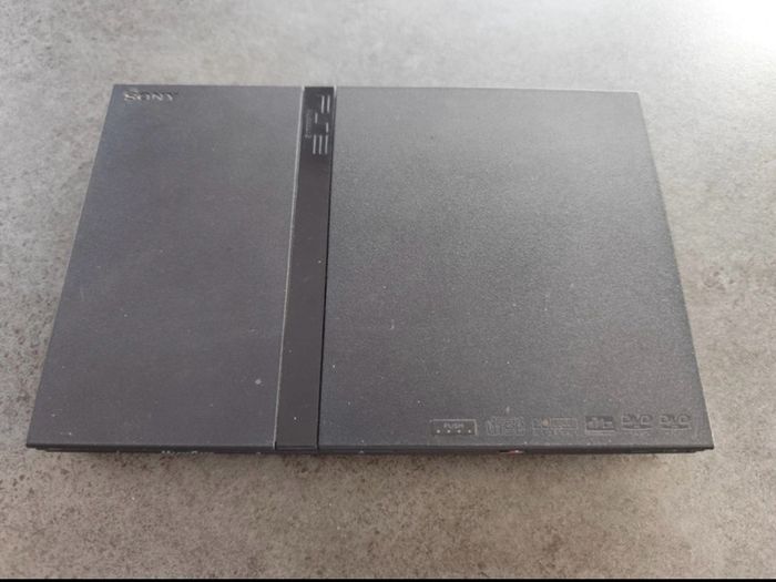 Original PS 2 Console, PS 2 games, 3 controllers as a bundle
