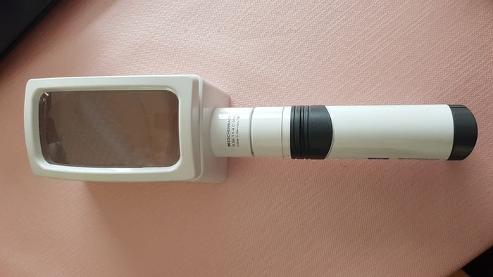 Magnifier with light. Eschenbach