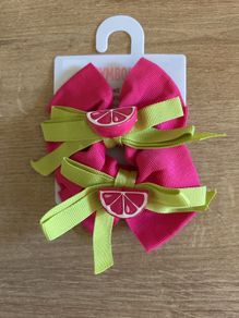 Gymboree bows brand new!
