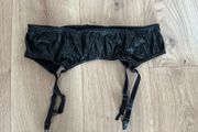 Wet look suspender belt