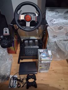 PlayStation 3 Super Slim 31 games/logitech g27 Bundle