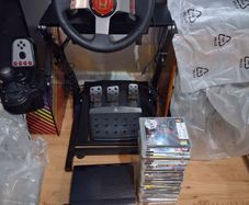 PlayStation 3 Super Slim 31 games/logitech g27 Bundle