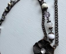 Vintage-bronze chain adorned with faux pearls and pastel beads