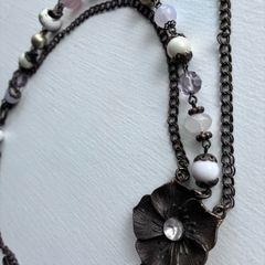 Vintage-bronze chain adorned with faux pearls and pastel beads