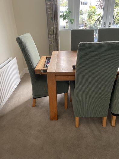 dining table and 8 leather chairs