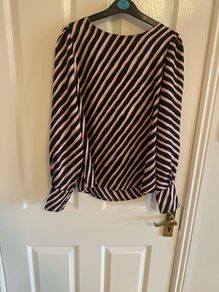 Beautiful red tall satiny skirt. Size10 and tall. New with tags