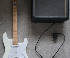 Squier Stratocaster electric guitar and Marshall MG15 amplifier