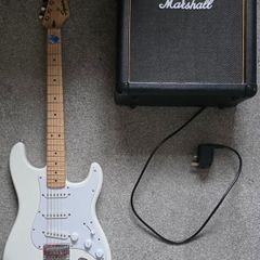 Squier Stratocaster electric guitar and Marshall MG15 amplifier