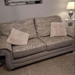 sofa and two arm chairs