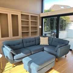 L-shaped sofa and footstool