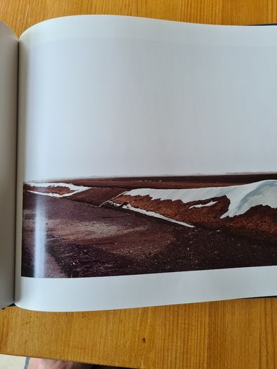 Under A GREY Sky. By Simon Burch. This Book Of Photos  Follows The landscape,people, & Towns Affected By The Collaps Of Board Na Mona's Peat Mining  Industry. IN IRELAND.