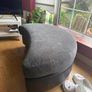 Grey crescent-shaped footstool with detachable top Image 2