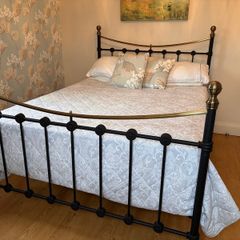 Black metal and brass double bed frame c/w mattress
