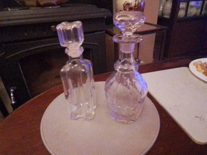 Four Glass Decanters with Stoppers