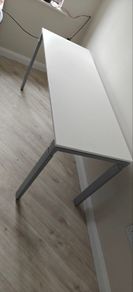 Desk with adjustable legs