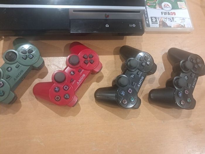 : PS3 Console Bundle (Faulty Disc Drive) + 4 Official Sony Controllers & Cables  Description: Selling a PlayStation 3 bundle for parts, repair, or digital-only use.