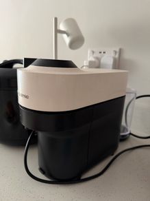 Nespresso Vertuo Coffee Machine with pods storage and leftover pods