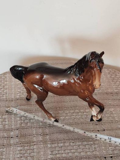 Vintage Royal Doultot porcelain horse. new in the box.