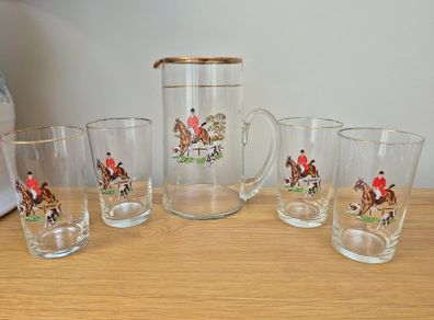 Vintage jug and four glasses with hunt scene