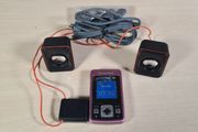 Sony Ericsson T303 pink mobile phone and speakers MPS-60
