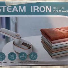 Selling a portable steam iron (Model HX-6198) in excellent condition.
