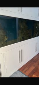 3000 litre salt water fish tank and cabinet