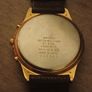 This is a gold-tone Seiko Vintage V657-8110 quartz chronograph watch featuring a cream dial with Roman numerals and three sub-dials Image 5
