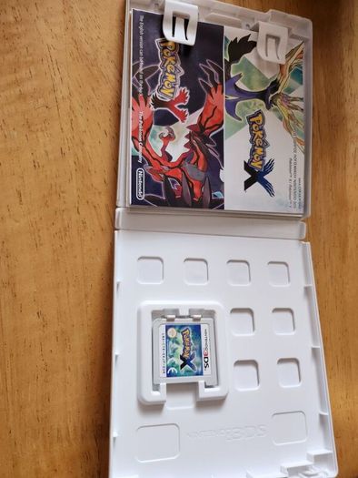 Pokemon X Game cartridge and boz