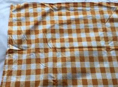 Orange and white gingham tablecloth