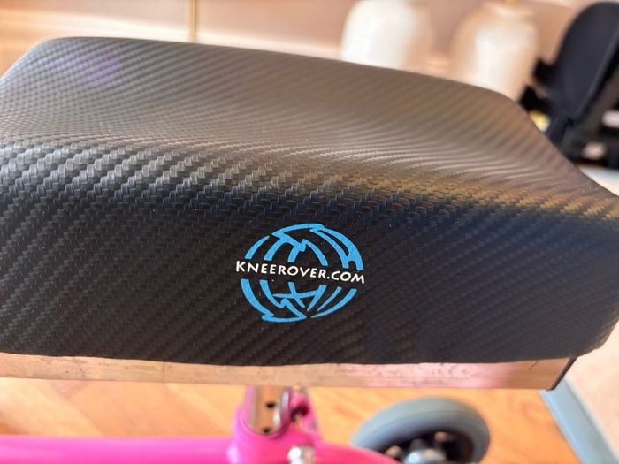 Kneerover Junior mobility knee scooter in pink. Well-used, but still working well!
