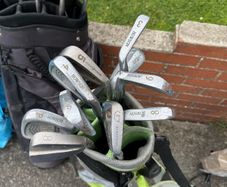golf clubs and bags