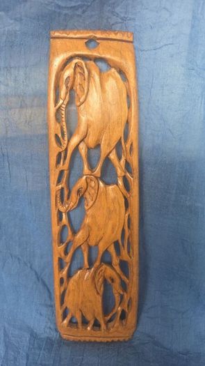 Hand-carved wooden elephant wall hanging
