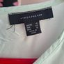 Mint green top. Image 2