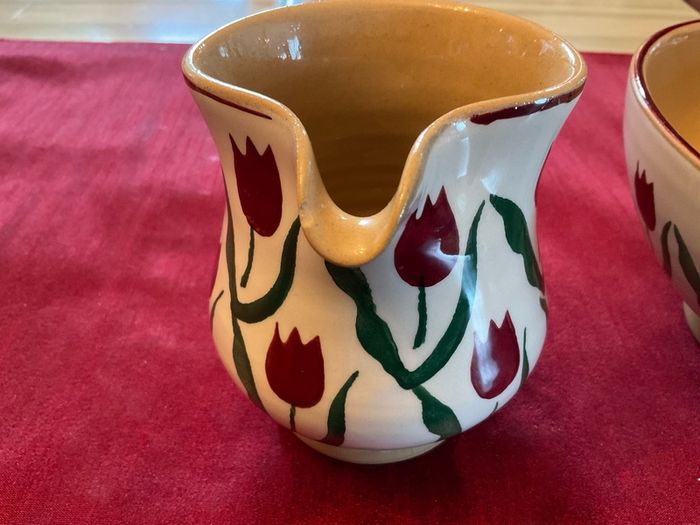 Nicholas Mosse Red lawn set of two , 4 inch jug and a 6 inch diameter bowl . Both have blemishes but perfect for  display
