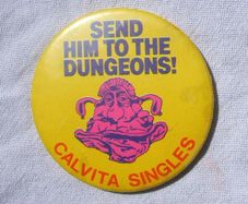 SEND HIM TO THE DUNGEONS! (Children's TV game show) - Calvita Cheese Singles promotional badge (c.1990)