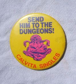 SEND HIM TO THE DUNGEONS! (Children's TV game show) - Calvita Cheese Singles promotional badge (c.1990)