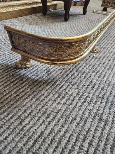 19 th Cent fender on claw feet. Polished