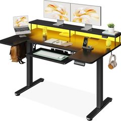 Standing Desk, 140cm U Shaped Height Adjustable Desk with Monitor Stand, Electric Sit Stand Rising Table with Sockets, Gaming Computer Table with LED Light for Home Office Workstation, Black