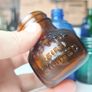 459 - Set of Three Beautiful Vintage Glass Decorative Collectible Bottles - Amber Eire Bovril, Cobalt Blue Magnesia and Turquoise Science Cream Image 2