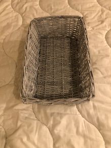 Grey wicker storage basket