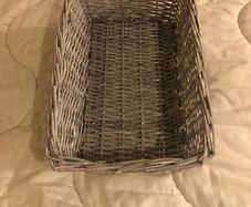 Grey wicker storage basket