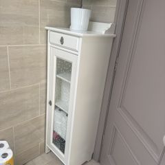 Bathroom storage in white.
