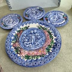 Vintage French Majolica Putti pottery plate, Barbotine, cherubs, musical, musicians, angles, pre loved, hanging, glass glazed, floral, round. --large plate  40.00 euro 27CM. diamter. -- small one 20.00 euro each . 14.5 CM. diamter    all set of 4 for  90.