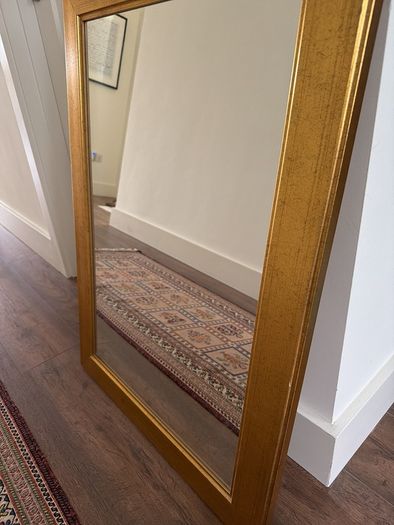 Gold finished wooden mirror