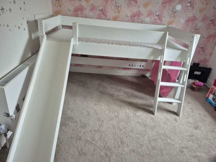 Mid sleeper bed with slide
